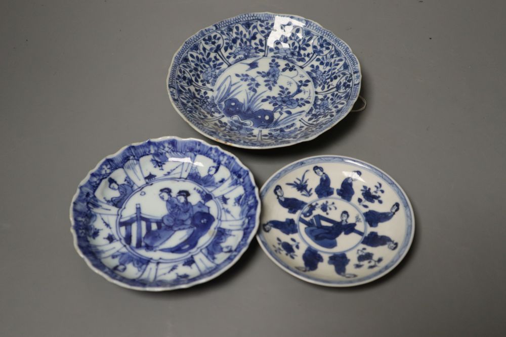 Three Chinese Kangxi blue and white tea bowls and saucers, largest 14cm (6)